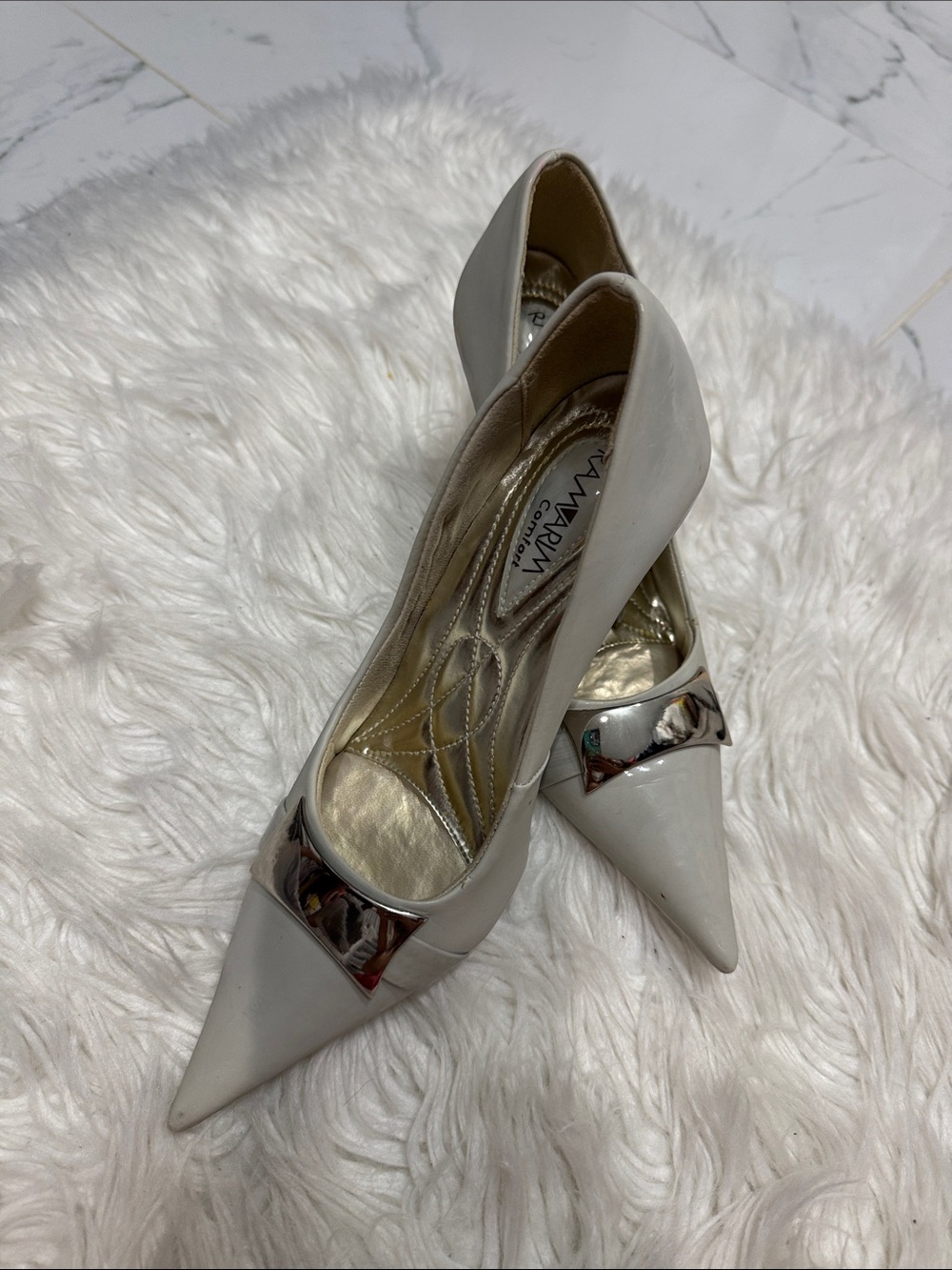 White Pointed Toe Pumps with Silver Accent -